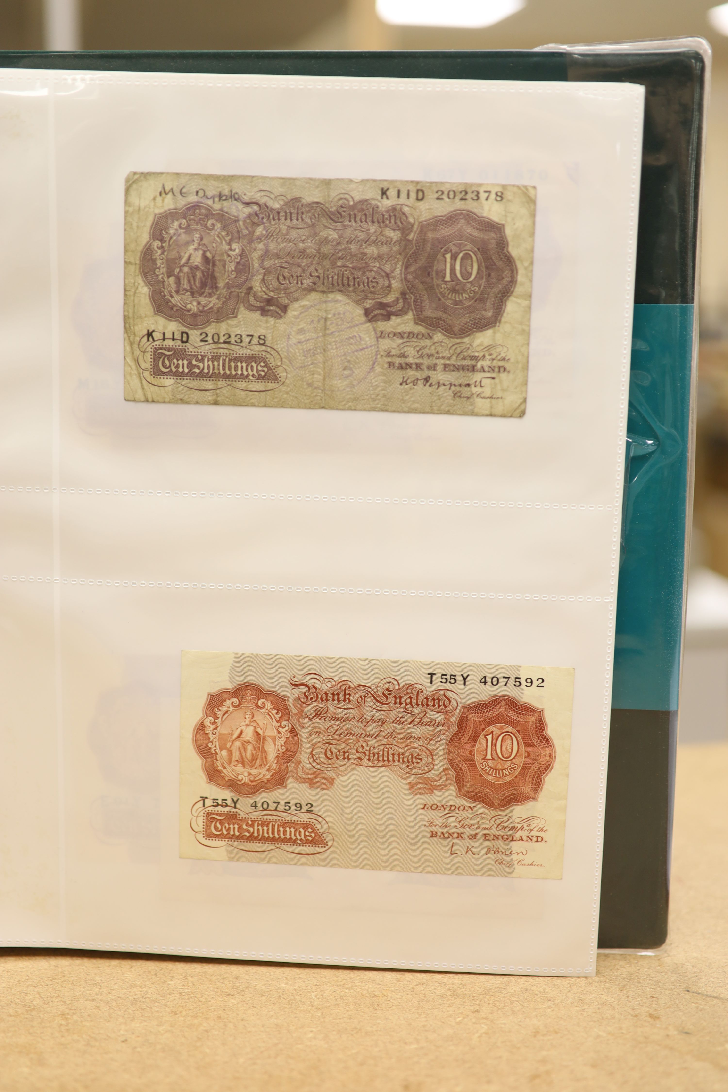A collection of Bank of England and Scottish banknotes to include: 21 QEII 10 shillings, 14 O'Brien and Beale 10 shillings, 1 Peppiatt 10 shillings, 4 Hallam one pound notes, 18 O'Brien or Beale one pound notes, 8 Peppia